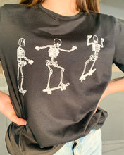 Load image into Gallery viewer, Skating Skeletons Graphic Tee
